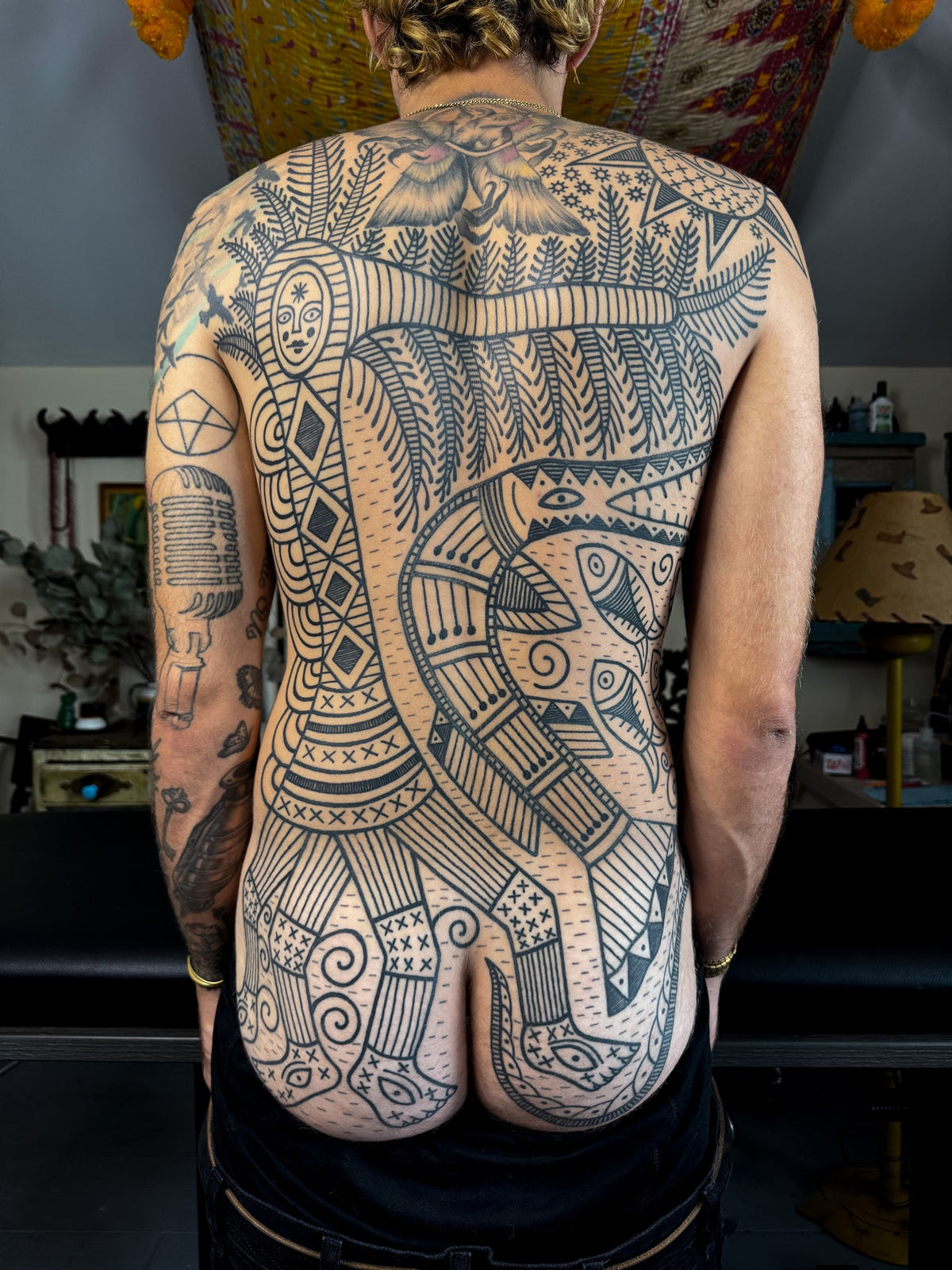 Large patterned back tattoo by Papayo Tattoo