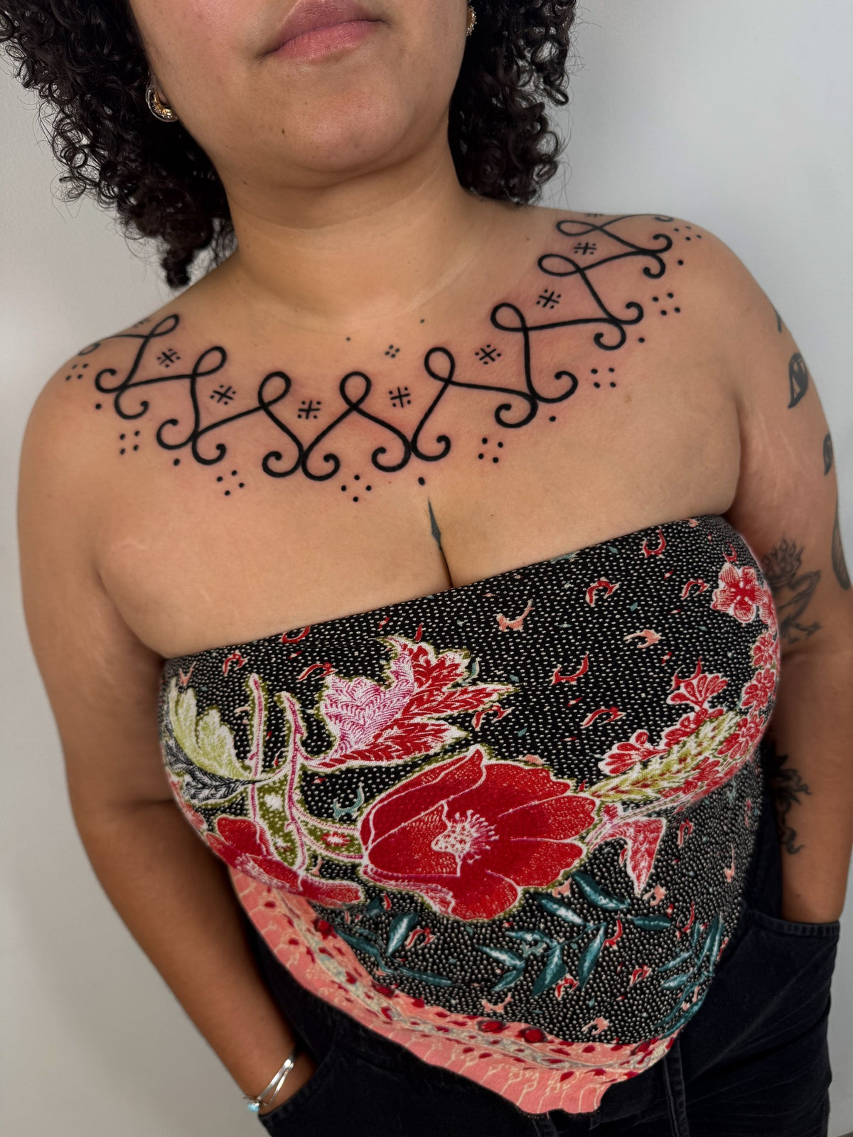 Ornamental collarbone tattoo